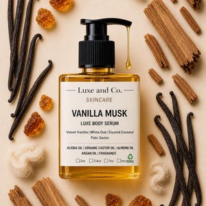 May include: A square glass bottle of Vanilla Musk Luxe Body Serum with a black pump dispenser. The bottle is surrounded by vanilla beans, wood pieces, amber-colored crystals, and white fibers. The label reads "Luxe and Co. SKINCARE VANILLA MUSK LUXE BODY SERUM".