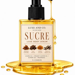 May include: A clear glass bottle of Luxe and Co. Sucre Luxe Body Serum with a black pump dispenser. The label lists ingredients including smoked caramel, oud wood, burnt sugar, and vanilla absolute. The bottle contains 3.4 ounces of golden liquid.