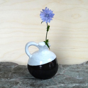 A small soliflore vase signed Jean-Claude Gagnon