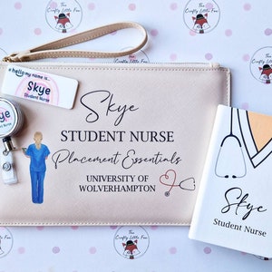 May include: A light pink zippered pouch with a black and white illustration of a nurse and the text "Skye STUDENT NURSE Placement Essentials UNIVERSITY OF WOLVERHAMPTON". A small white notebook with a black and white illustration of a stethoscope and the text "Skye Student Nurse" is next to the pouch.