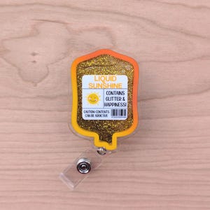 サンシャイン液体シェーカーバッジリール、IVバッグバッジリール、看護師や医師へのノベルティギフト、看護学生向け