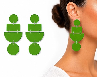 Hangoorbellen van groene polymeerklei: modern geometrisch statement