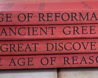 Vintage history books red covers staging decorative Ancient Greeks Age of Reformation Great Discoveries Age of reason