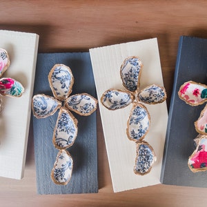 Floral patterned oyster shell cross