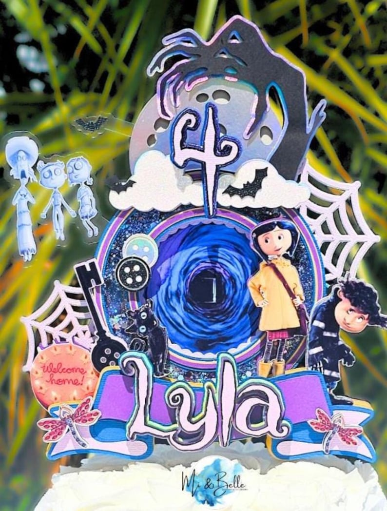 May include: A layered cake topper featuring characters and elements from the movie Coraline. The design includes the name "Lyla", a number "4", a black cat, a key, and a spiderweb. The color scheme includes blue, purple, and pink.