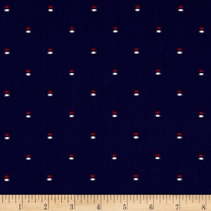 May include: Navy blue fabric with a repeating pattern of small red and white squares.