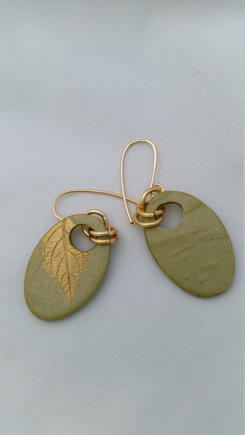 Polymer Clay Earrings...leaf impressions on olive green Etsy