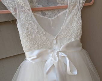 Couture flower girl dress " Grace" with white straight tea length skirt,  French lace, rhinestone sash, communion dress