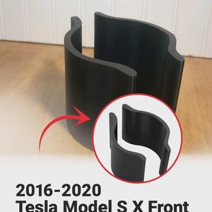 May include: Black console cup holder divider insert upgrade for Tesla Model S and X vehicles from 2016-2020. The insert is made of a curved, solid material. A red arrow points to a circular inset showing the product.