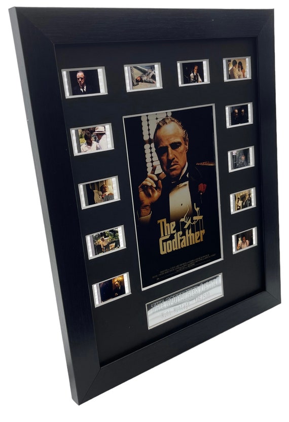B) The Godfather (1972) 35mm original  filmcell , ( We recommend adding the lightbox when ordering)