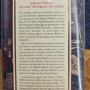 May include: A vintage Johnnie Walker whisky canister with text. The text reads "Johnnie Walker; the man, the legend, the whisky." The canister features a nostalgic scene of a coach stop and passengers.