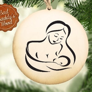 Mamma che allatta al seno Madre che tiene il regalo del bambino per la nuova mamma Maternità Baby Shower Presente Mamma che allatta al seno Mamma e baby Nursing Mother