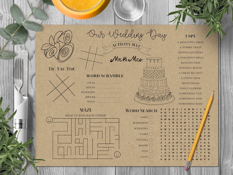 May include: A printable wedding activity mat with games like tic-tac-toe, word scramble, maze, word search, and I Spy. The mat features a wedding cake illustration and the text "Our Wedding Day".