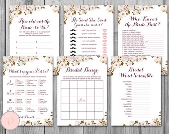 May include: A set of printable bridal shower games with floral designs. The games include "How old was the bride-to-be?", "He said she said", "Who knows the bride best?", "What's in your purse?", "Bridal Bingo", and "Bridal Word Scramble".