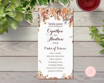 May include: A wedding order of service card with a fall theme. The card features a watercolor illustration of autumn leaves and vines. The text reads "Welcome to the Wedding of Cynthia and Andrew 27.11.21 Order of Service".