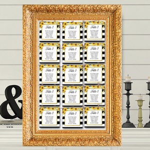 May include: A gold framed seating chart with black and white striped cards featuring sunflowers and the text "Table 1". Each card lists guest names.