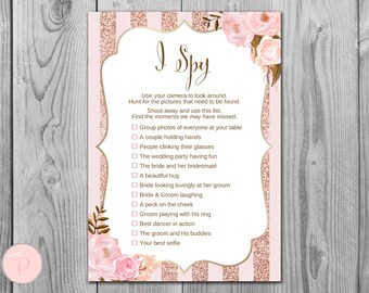 May include: A pink and gold printable I Spy game with a floral design. The game includes a list of items to find at a wedding reception, such as a couple holding hands, people clinking glasses, and the bride and groom laughing.