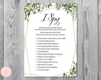 May include: A printable I Spy game with a gold geometric frame and green foliage. The game includes a list of items to find in wedding photos, such as a couple holding hands, the bride and groom laughing, and the best dancer in action.