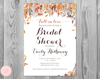 May include: Fall-themed bridal shower invitation with a watercolor illustration of autumn leaves in shades of orange, red, and yellow. The text reads "Fall in love" and "Please join us for a Bridal Shower honoring Emily Hathaway". The date, time, and location are also included, along with the registry information.