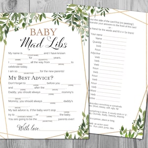 May include: A printable baby shower game card with a gold and green floral design. The card features a Mad Libs game with the title "Baby Mad Libs".