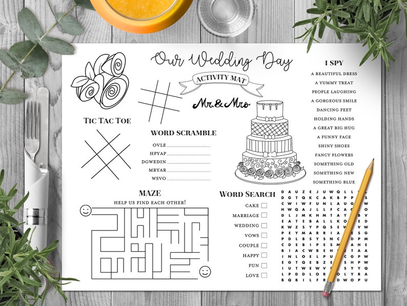 May include: A black and white printable wedding activity mat with games like tic-tac-toe, word scramble, maze, word search, and I Spy. The games are themed around a wedding with images of a wedding cake and roses.