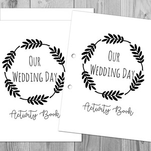 May include: Two printable activity book covers featuring a black wreath design and the text "Our Wedding Day Activity Book".