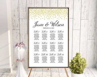 May include: A wedding seating chart with a gold glitter background. The chart lists the names of guests assigned to each table. The chart is titled "Jane & Wilson" and the date "February 21, 2020".
