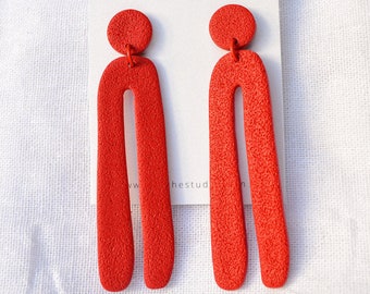 Long organic arch earrings