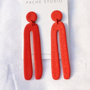 Long organic arch earrings