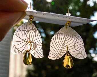 Translucent white floral dangle earrings