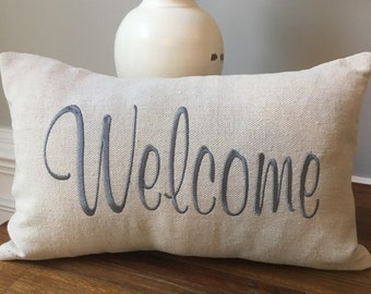 Welcome pillow embroidered on canvas material