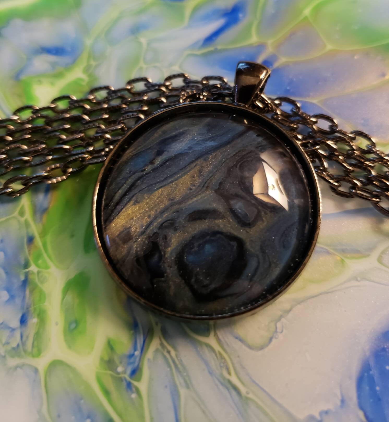Fluid Art jewelry pendant on 30 chain. Gunmetal blues Etsy