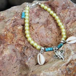 Elephant bracelet with yellow, turquoise beads and shells