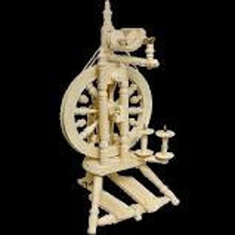 May include: A wooden spinning wheel with a white finish. The wheel has a large, round, spoked wheel with a smaller wheel on the side. There are two spindles on the bottom of the wheel.