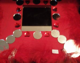 Red Feathered Mirror