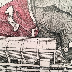 May include: A black and white illustration of a large elephant wearing a red jersey with the number "1" on it. The elephant is standing on top of a stadium with bleachers.