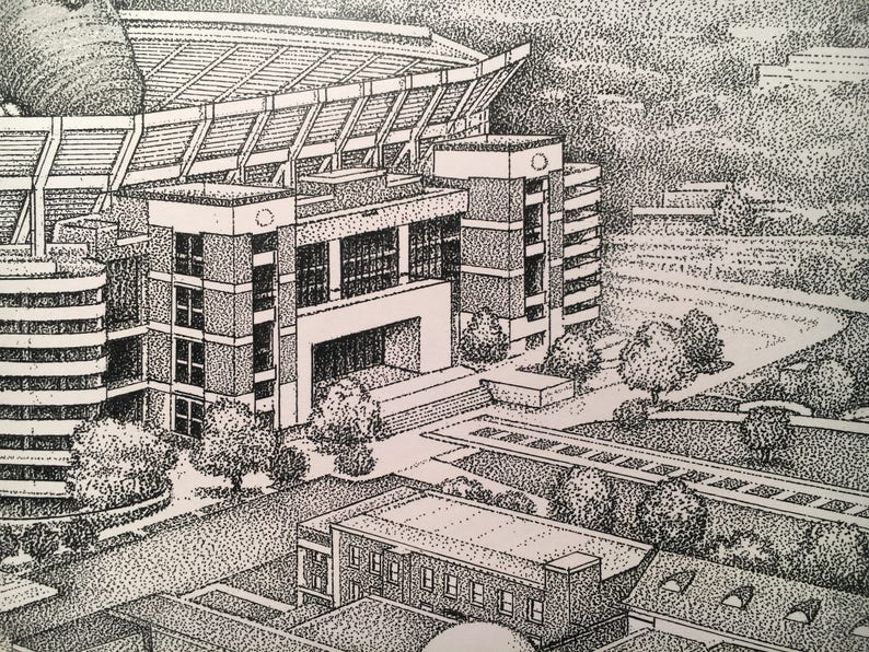 May include: A black and white pen and ink drawing of a stadium with a building in front of it. The stadium has a large, open roof and a series of rows of seats. The building in front of the stadium has a flat roof and a series of windows. There are trees and bushes in the foreground.