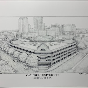May include: Black and white pen and ink drawing of Campbell University School of Law building in a city setting. The building is in the foreground and the city skyline is in the background. The drawing is signed and numbered 1/100.