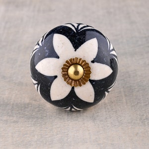 White Round Ceramic Dresser Knob With Black Floral Print