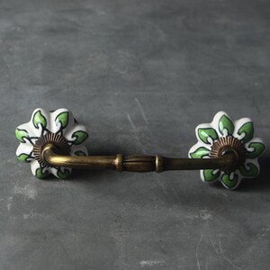 Green Flower Design On White Base Cupboard Cabinet or Drawer Pull (Sold in Sets)