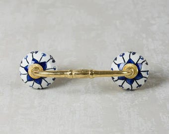 Gebloemde keramische ladehendel: blauw-witte vintage kastknop