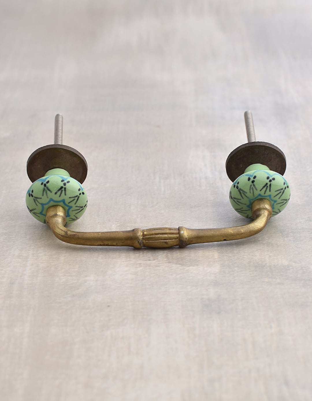 Lime Green and Turquoise Design on a Lime Green Pull sold in