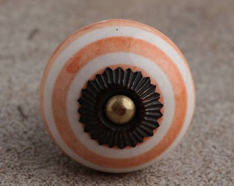 Oranje gestreepte kastknop: meubelbeslag metaalaccent