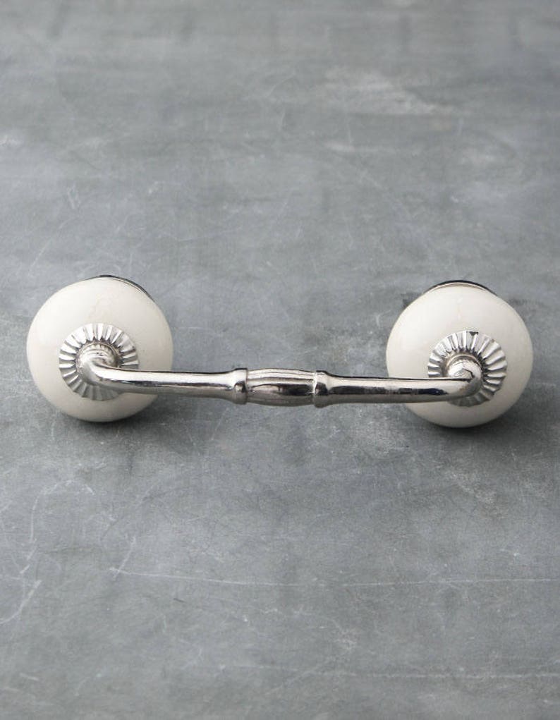 Cream Colored Unique Ceramic Handle Pull sold in Etsy
