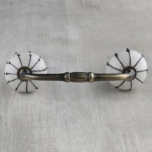 White Ceramic Drawer Cabinet Pull With Black Spiral Lines (Sold in Sets)
