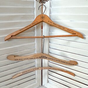 Wood Kids Coat Hanger Moon Shaped Wooden Clothes Hanger for Children -  China Hanger and Hangers price