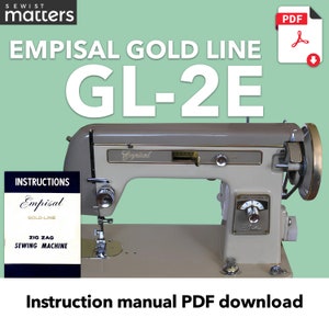 Pode incluir: Uma máquina de costura zig zag Empisal GL-2E Gold Line branca com um manual de instruções preto. O manual tem o texto "Empisal Gold-Line Zig Zag Sewing Machine".