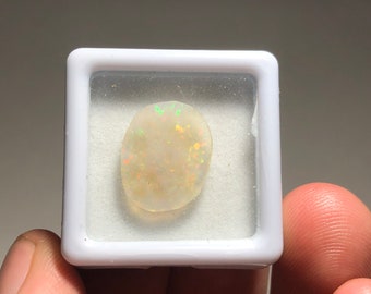 Item:O18558 Mexico Top Quality 6.3ct Polished Fire Opal Crystal Cabochon Perfect for Jewelry