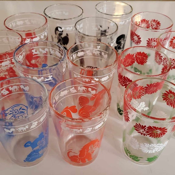Swanky Swigs Hazel Atlas Glass Co depression era 1930s juice glasses with novelty or floral designs 4 ounce assorted colours & patterns