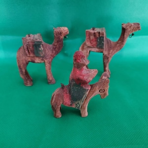 Set of 3 hand carved & painted wooden figures 2 camels with packs 1 donkey with monkey riding on the back 2.5-3&quot; tall aged worn condition